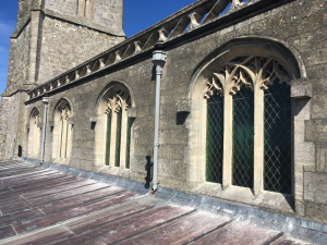 High level church window repair - group of windows